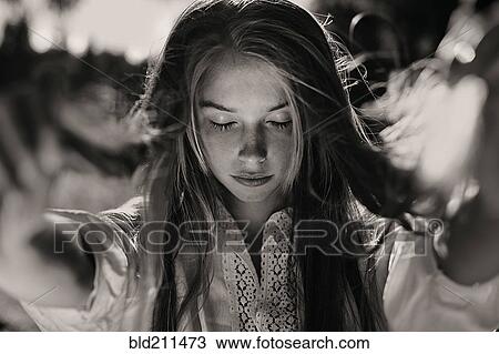 Stock Image - Serene Caucasian girl. Fotosearch