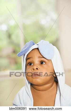 Serious African American boy in towel View Large Photo Image Stock Image - Serious African American boy in towel. Fotosearch
