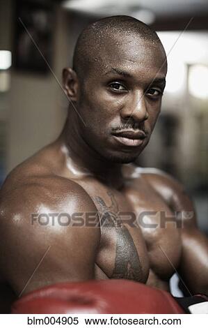 Stock Photography - Serious African boxer. Fotosearch