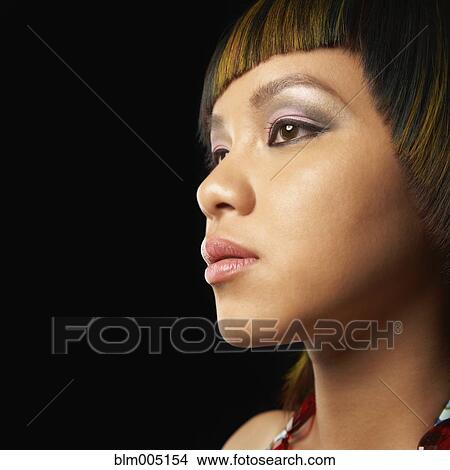Serious Asian woman View Large Photo Image Picture - Serious Asian woman. Fotosearch