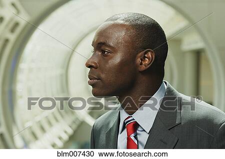 Stock Image - Serious Black businessman. Fotosearch