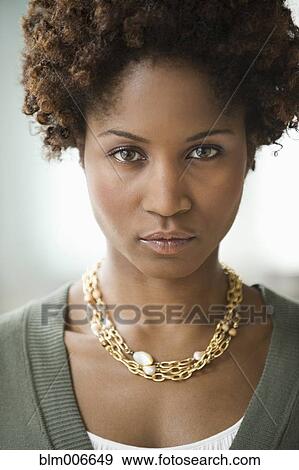 Stock Photo - Serious Black woman. Fotosearch