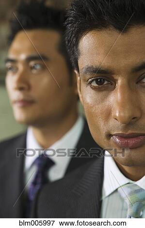 Stock Photo - Serious businessmen. Fotosearch