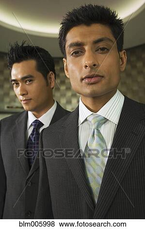 Serious businessmen View Large Photo Image Stock Photo - Serious businessmen. Fotosearch