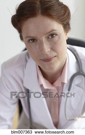 Stock Image - Serious Caucasian doctor. Fotosearch
