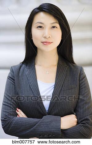 Stock Photo - Serious Chinese businesswoman. Fotosearch
