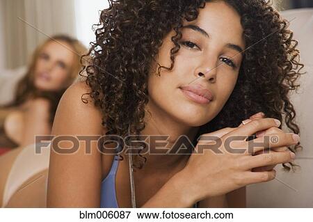 Stock Photo - Serious mixed race woman. Fotosearch
