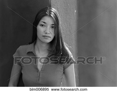 Stock Photography - Serious mixed race woman. Fotosearch