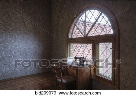 Sewing table at window View Large Photo Image Stock Photo - Sewing table at window. Fotosearch