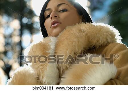 Sexy Hispanic woman wearing fur coat View Large Photo Image Stock Image - Sexy Hispanic woman wearing fur coat. Fotosearch
