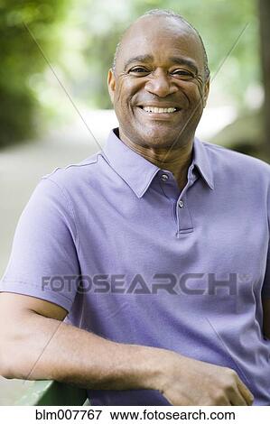 Smiling African American man View Large Photo Image Stock Photo - Smiling African American man. Fotosearch
