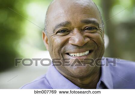 Smiling African American man View Large Photo Image Stock Photo - Smiling African American man. Fotosearch