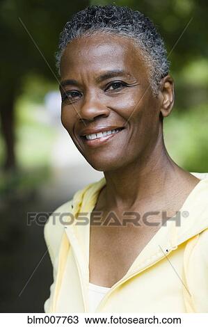 Smiling African American woman View Large Photo Image Stock Image - Smiling African American woman. Fotosearch