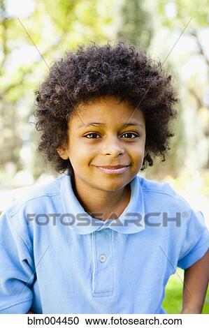 Stock Image - Smiling African boy. Fotosearch
