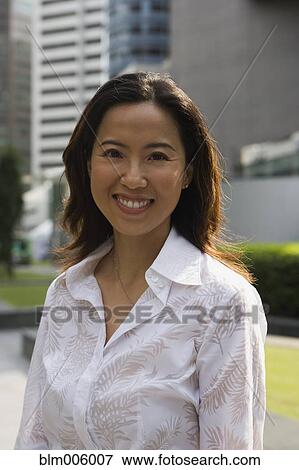 Smiling Asian woman View Large Photo Image Stock Photo - Smiling Asian woman. Fotosearch