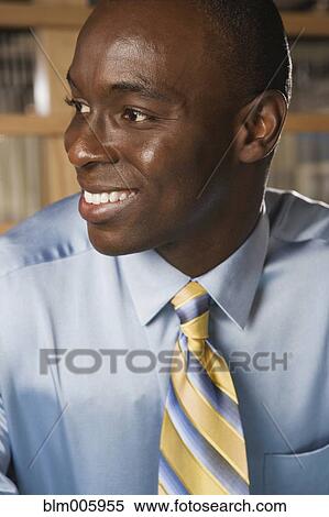 Smiling Black businessman View Large Photo Image Stock Photography - Smiling Black businessman. Fotosearch