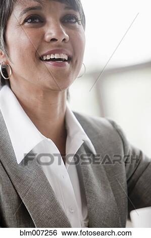 Stock Photograph - Smiling businesswoman. Fotosearch