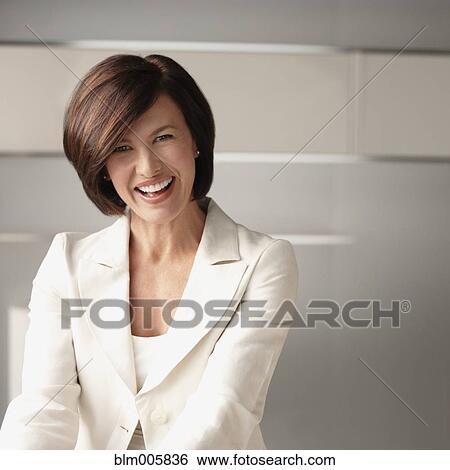 Smiling Caucasian businesswoman View Large Photo Image Stock Photograph - Smiling Caucasian businesswoman. Fotosearch