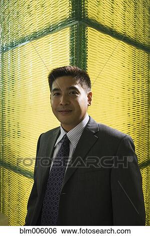 Stock Photograph - Smiling Chinese businessman. Fotosearch