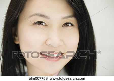 Stock Image - Smiling Chinese businesswoman. Fotosearch