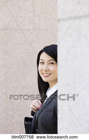 Stock Photo - Smiling Chinese businesswoman. Fotosearch