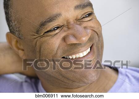 Smiling mixed race man View Large Photo Image Stock Image - Smiling mixed race man. Fotosearch