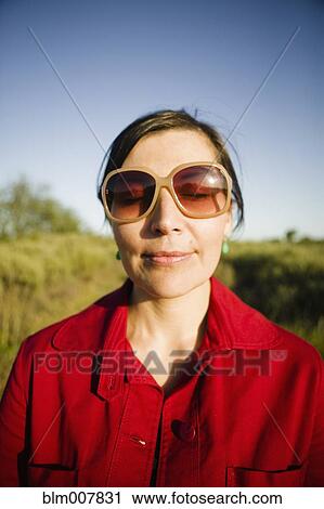 Smiling mixed race woman with eyes closed View Large Photo Image Stock Image - Smiling mixed race woman with eyes closed. Fotosearch