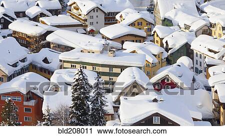 Stock Image - Snowy Swiss Rooftops. Fotosearch