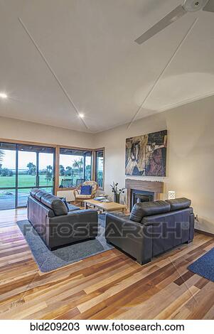 Stock Image - Sofa and armchairs in hotel lounge. Fotosearch