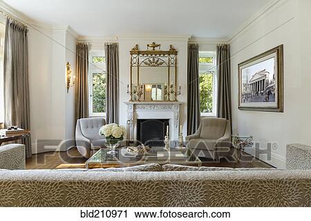 Sofa and armchairs in ornate living room View Large Photo Image Stock Image - Sofa and armchairs in ornate living room. Fotosearch