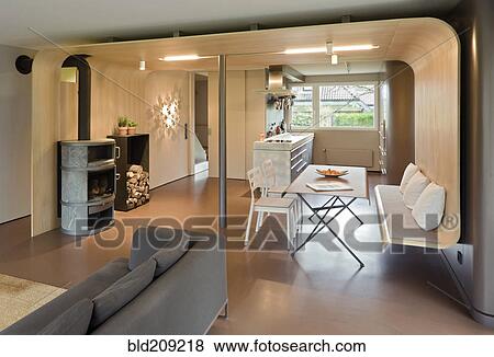 Sofa, dining table and chairs in modern home View Large Photo Image Stock Photo - Sofa, dining table and chairs in modern home. Fotosearch