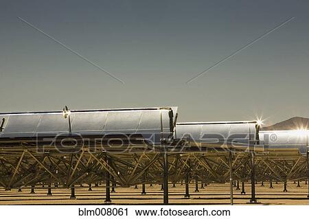 Solar panels in desert View Large Photo Image Stock Image - Solar panels in desert. Fotosearch