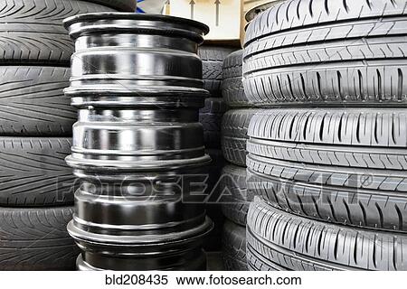 Stack of new rubber tires View Large Photo Image Stock Photography - Stack of new rubber tires. Fotosearch