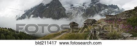 Stock Photo - Stone cottages near Mt Blanc trail, Bertone Refuge, Italy. Fotosearch