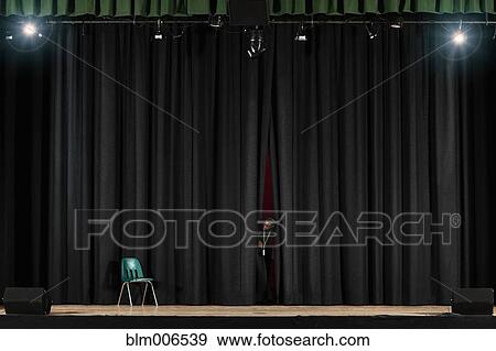 Student peering from behind curtain on stage View Large Photo Image Stock Photo - Student peering from behind curtain on stage. Fotosearch