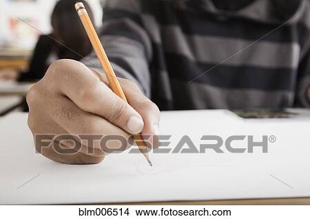Student's hand writing with pencil View Large Photo Image Picture - Student's hand writing with pencil. Fotosearch