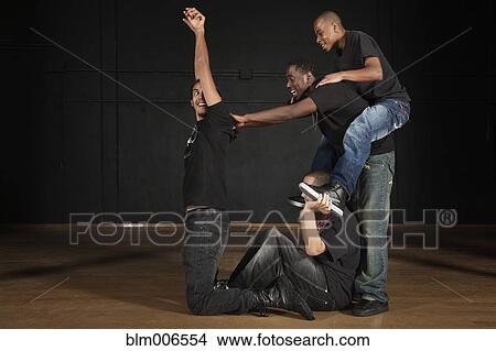 Picture - Students performing on high school stage. Fotosearch