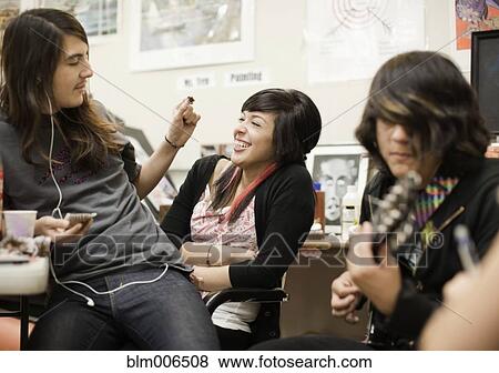 Stock Photo - Students playing in classroom. Fotosearch