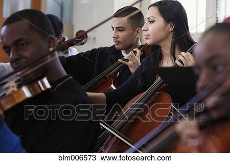 Students practicing in high school orchestra View Large Photo Image Stock Image - Students practicing in high school orchestra. Fotosearch