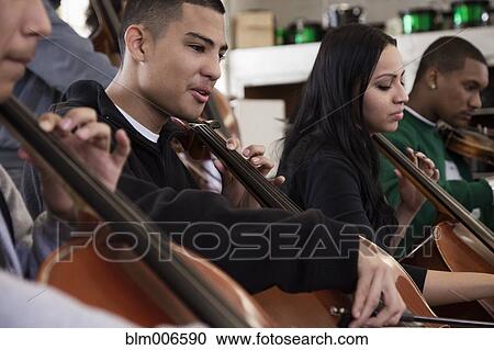 Students practicing in high school orchestra View Large Photo Image Stock Image - Students practicing in high school orchestra. Fotosearch