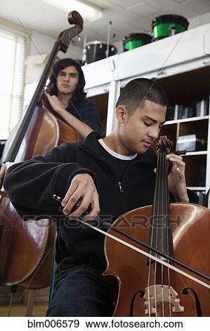 Students practicing in high school orchestra View Large Photo Image Stock Photo - Students practicing in high school orchestra. Fotosearch