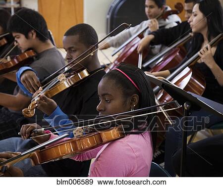 Students practicing in high school orchestra View Large Photo Image Stock Photo - Students practicing in high school orchestra. Fotosearch