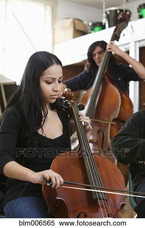Students practicing in high school orchestra View Large Photo Image Stock Photography - Students practicing in high school orchestra. Fotosearch