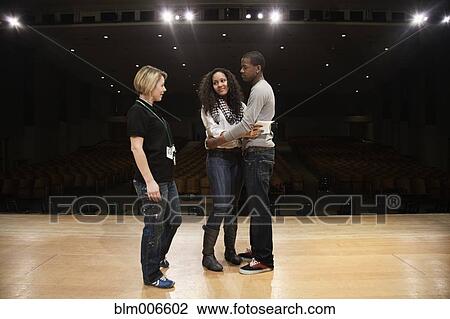 Students rehearsing onstage View Large Photo Image Stock Image - Students rehearsing onstage. Fotosearch