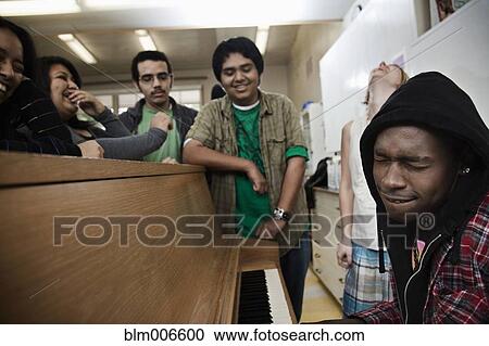 Students singing in classroom View Large Photo Image Stock Image - Students singing in classroom. Fotosearch
