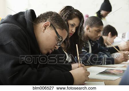 Students studying in classroom View Large Photo Image Stock Photo - Students studying in classroom. Fotosearch