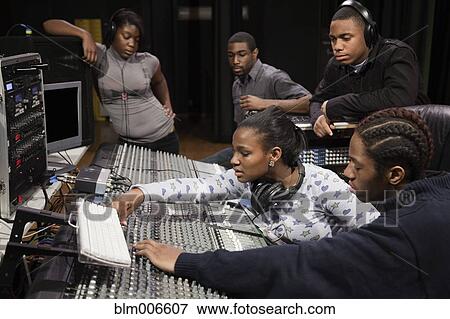 Students working with sound mixer View Large Photo Image Stock Photo - Students working with sound mixer. Fotosearch