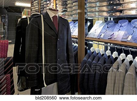 Suits on display in menswear shop View Large Photo Image Stock Image - Suits on display in menswear shop. Fotosearch