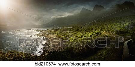 Picture - Sun shining over rural coastline, Cape Town, Western Cape, South Africa. Fotosearch