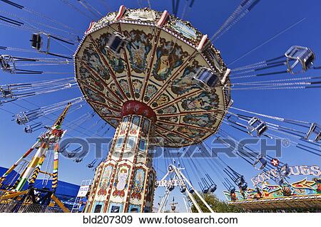 Swing Ride at the Fair View Large Photo Image Stock Photo - Swing Ride at the Fair. Fotosearch